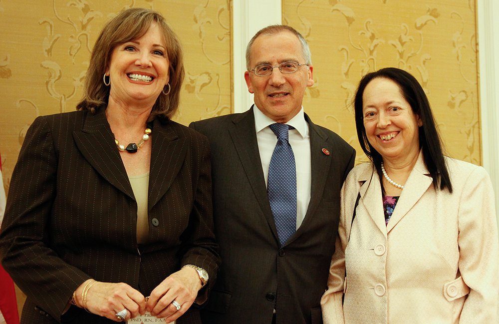 Pictured L-R: Dean Frazier with UTHealth Houston President Giuseppe Colasurdo, MD, and former McGovern Medical School Dean Barbara J. Stoll, MD.