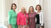 Pictured (L-R): PARTNERS Spring Luncheon Chairs Susan Distefano, MSN, RN, and Trish Greaser with Dean Diane Santa Maria and keynote speaker Annie Griffiths.