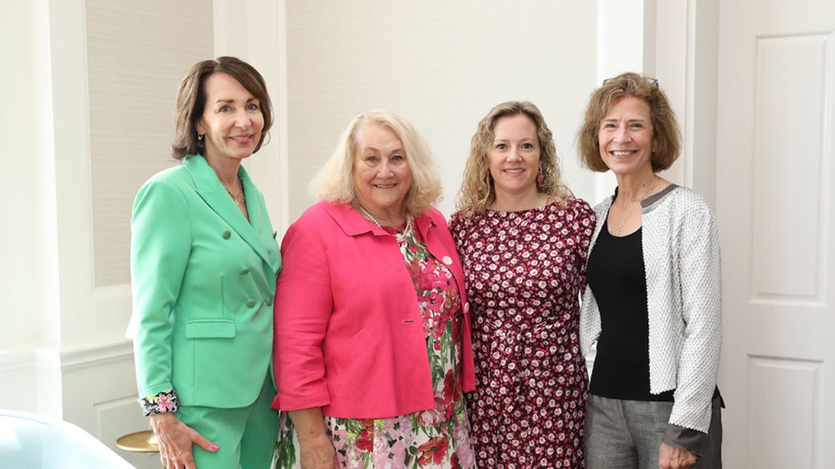 Luncheon co-chairs Susan Distefano and Trish Greaser with Dean Diane Santa Maria and Annie Griffiths.