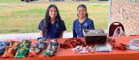 Two BSN students at a community event.