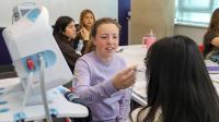 High school students visiting Cizik School of Nursing sim lab.