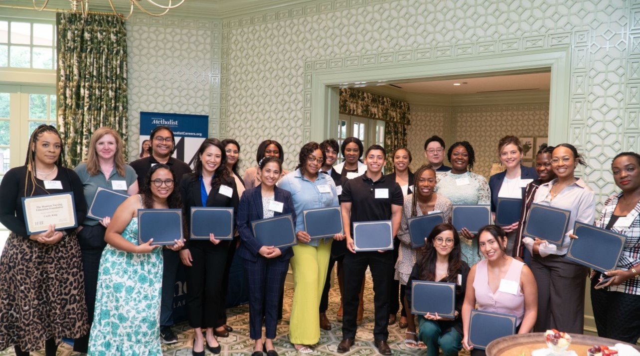 A large group of a Cizik School of Nursing students at an HNEF event