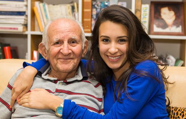 Stock image of an old man and young girl