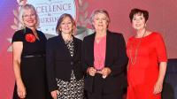 Linda Cole receiving her silver award