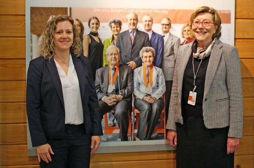 Dean Santa Maria and Associate Dean for Research Constance Johnson at the Cizik memorial wall.