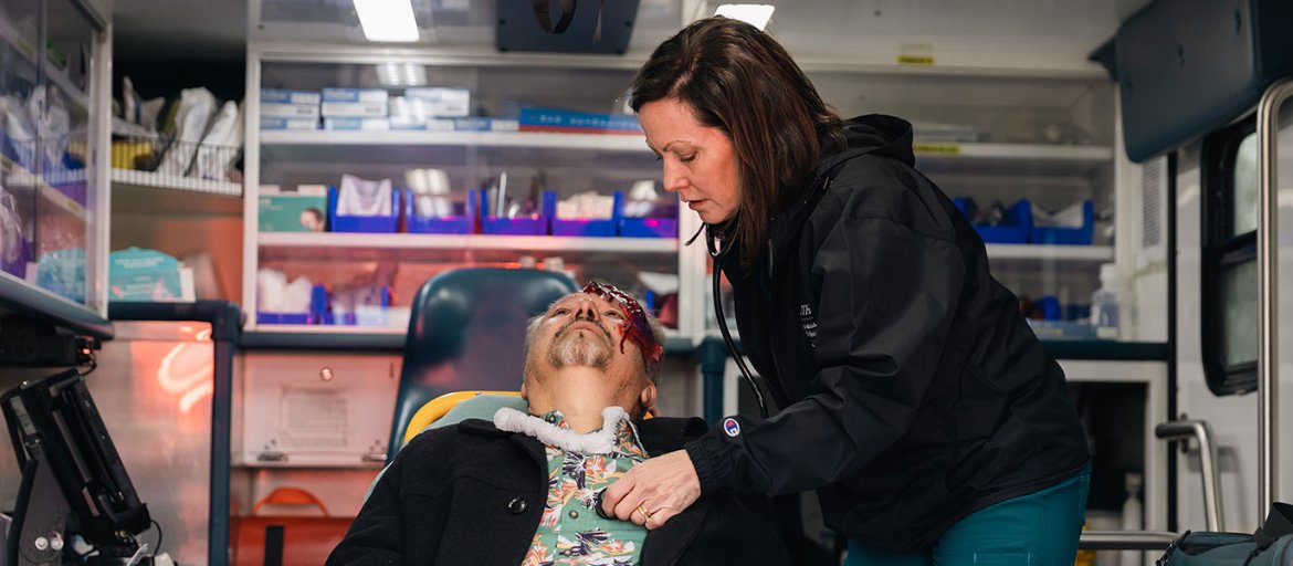 Nurse practitioner student with a standardized patient at the 2022 mass casualty