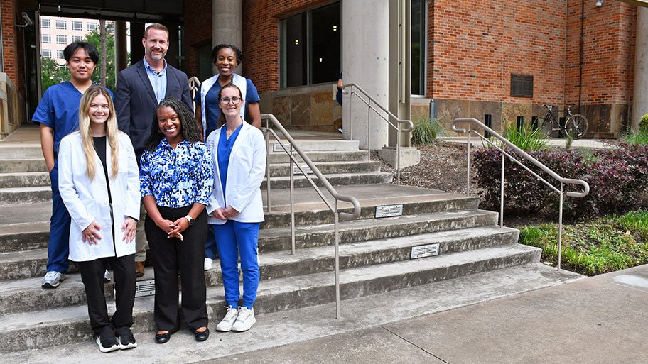 Nursing students from all degrees in front of the building