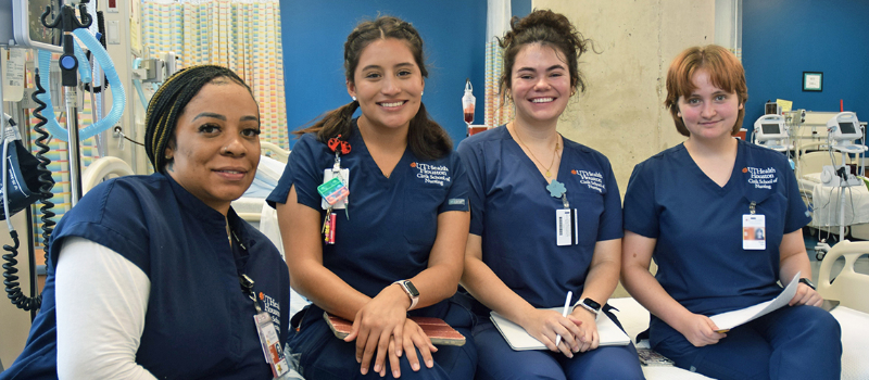 Four BSN students in the simulation lab