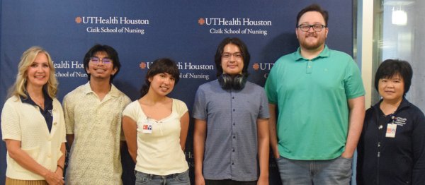 The inaugural cohort of students in the Pre-Nursing pathway with Sara Lewandowski and Erica Yu.