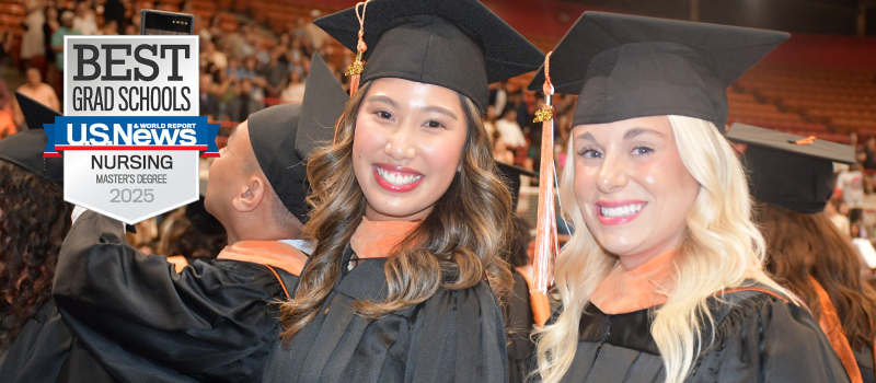 Commencement snapshot with two students in the foreground and the US News & World Report Best Grad School's 2025 badge for nursing master's degree.
