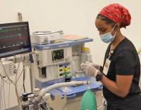 A nurse anesthesia student practices skills in the Pre-Clinical Care Laboratory. (Photo courtesy Cizik School of Nursing)