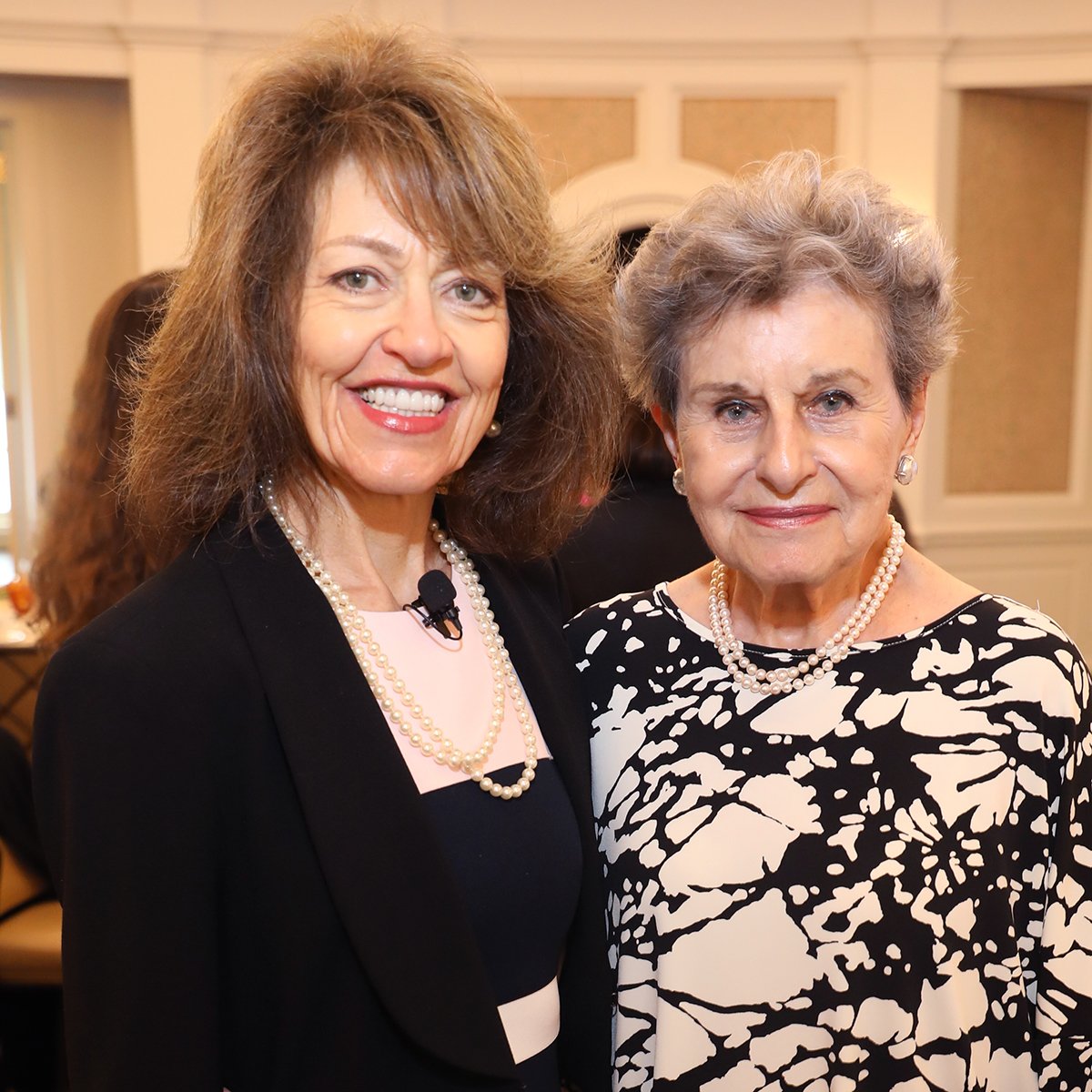 PARTNERS Spring Luncheon keynote speaker Diane Seig, RN, visits with Cizik School of Nursing benefactor Jane Cizik.