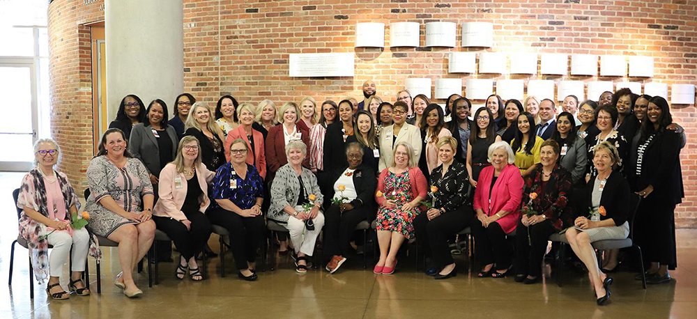 Cizik School of Nursing’s largest-ever class of 41 DNPs graduated in 2022. Seated in front are DNP faculty and staff members.