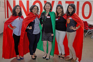 Organizer Dr. Jing Wang (center) with caped participants at the inaugural “UTHealth Mobile and Connected Health Hackathon” at the TMC Innovation Institute. Organizer Dr. Jing Wang (center) with caped participants at the inaugural “UTHealth Mobile and Connected Health Hackathon” at the TMC Innovation Institute.