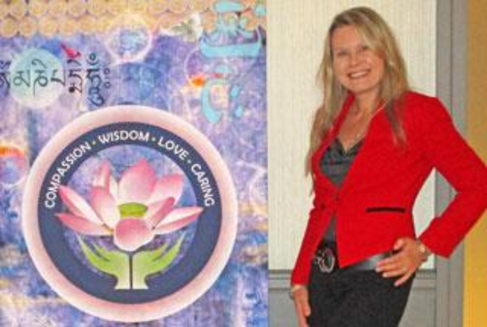 New Caritas Coach® Michelle Peck in Boulder, Col., next to the seal of the Watson Caring Science Institute.