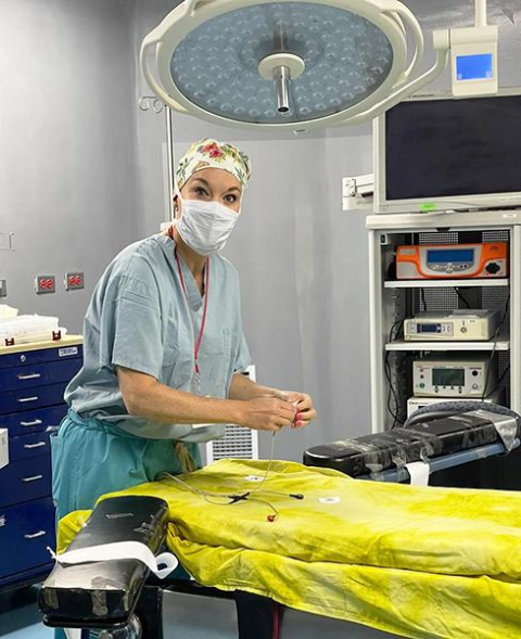 Assistant Professor Amy Blok prepares to for a procedure during her medical mission to Guatemala.