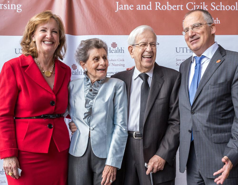 Dean Lorraine Frazier (left) and UTHealth Houston President Giuseppe N. Colasurdo, MD (right) share a laugh with the Ciziks at the naming ceremony. Dean Lorraine Frazier (left) and UTHealth Houston President Giuseppe N. Colasurdo, MD (right) share a laugh with the Ciziks at the naming ceremony.