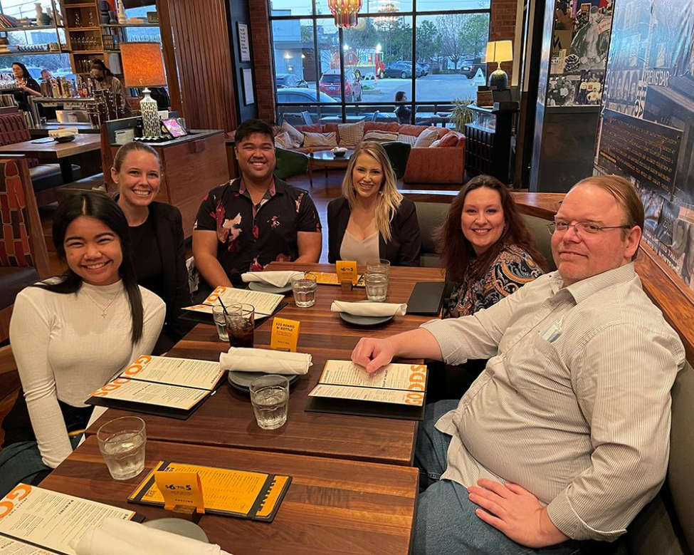 Evan Brietzke (right) hosted a dinner for nursing students.