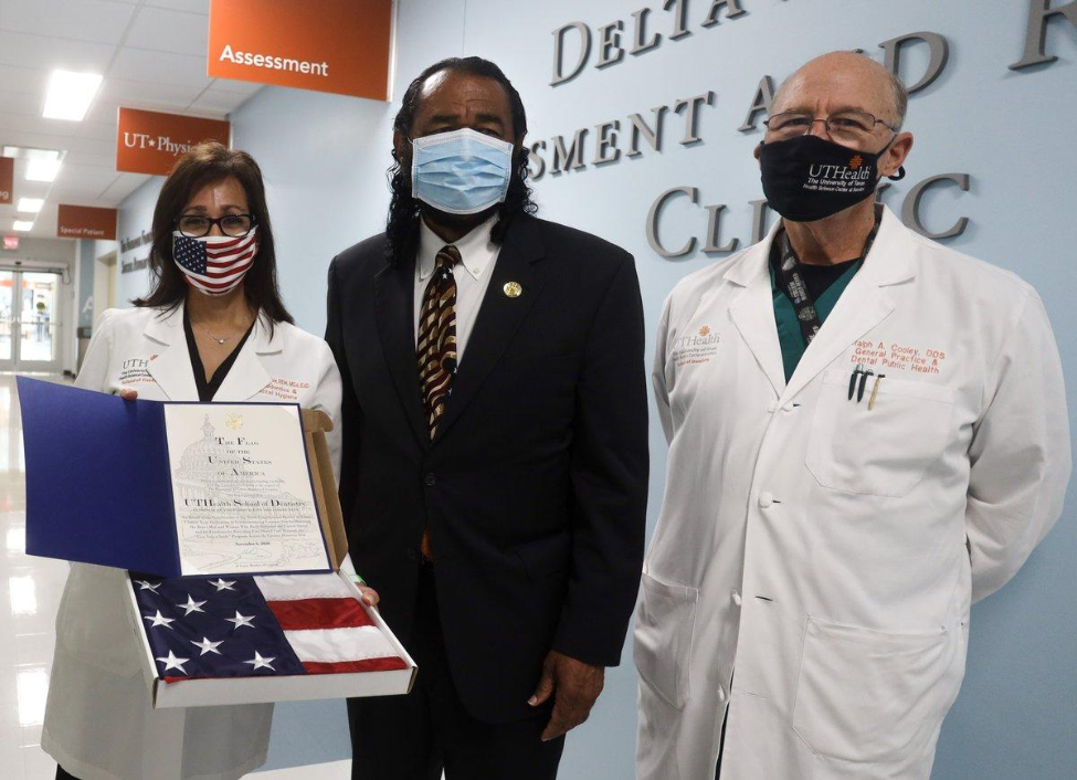 Congressman Al Green (center) presented veterans with a U.S. flag to thank them for their service. Green is pictured with Drs. Margo Melchor (left) and Ralph Cooley. Congressman Al Green (center) presented veterans with a U.S. flag to thank them for their service. Green is pictured with Drs. Margo Melchor (left) and Ralph Cooley.