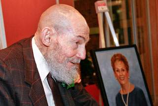 Dr. Herb Fred, alongside professorship namesake Judy Fred’s official portrait, at the Dec. 2010 reception that introduced recipient Dr. Joan Engebretson. (Photo by John Everett) Dr. Herb Fred, alongside professorship namesake Judy Fred’s official portrait, at the Dec. 2010 reception that introduced recipient Dr. Joan Engebretson. (Photo by John Everett)