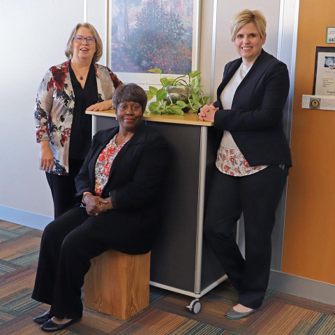 Cizik School of Nursing at UTHealth Houston DNP Program Directors Dr. Kathleen Siders and Dr. Lisa Boss (standing) with Senior Administrative Coordinator Candiance Duplessis. Cizik School of Nursing at UTHealth Houston DNP Program Directors Dr. Kathleen Siders and Dr. Lisa Boss (standing) with Senior Administrative Coordinator Candiance Duplessis.