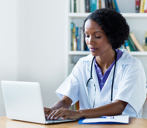Stock picture of a nurse practitioner on a laptop, courtesy Getty images